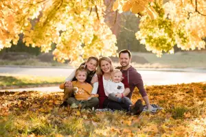 Haynie family under fall trees
